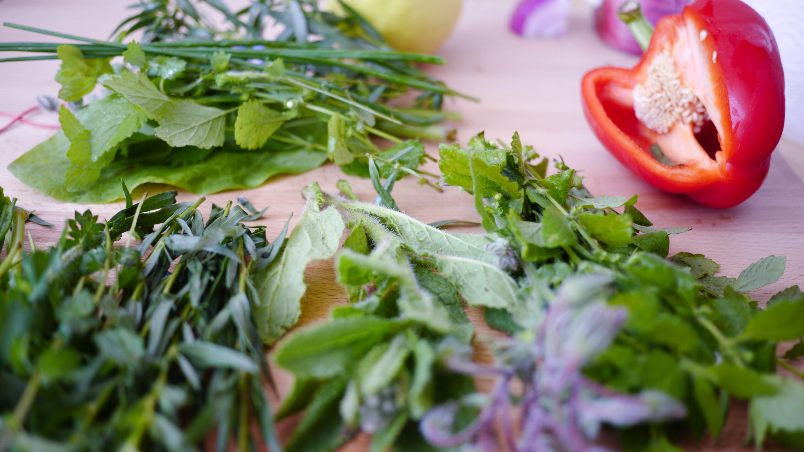 Fresh herbs on a kitchen surface