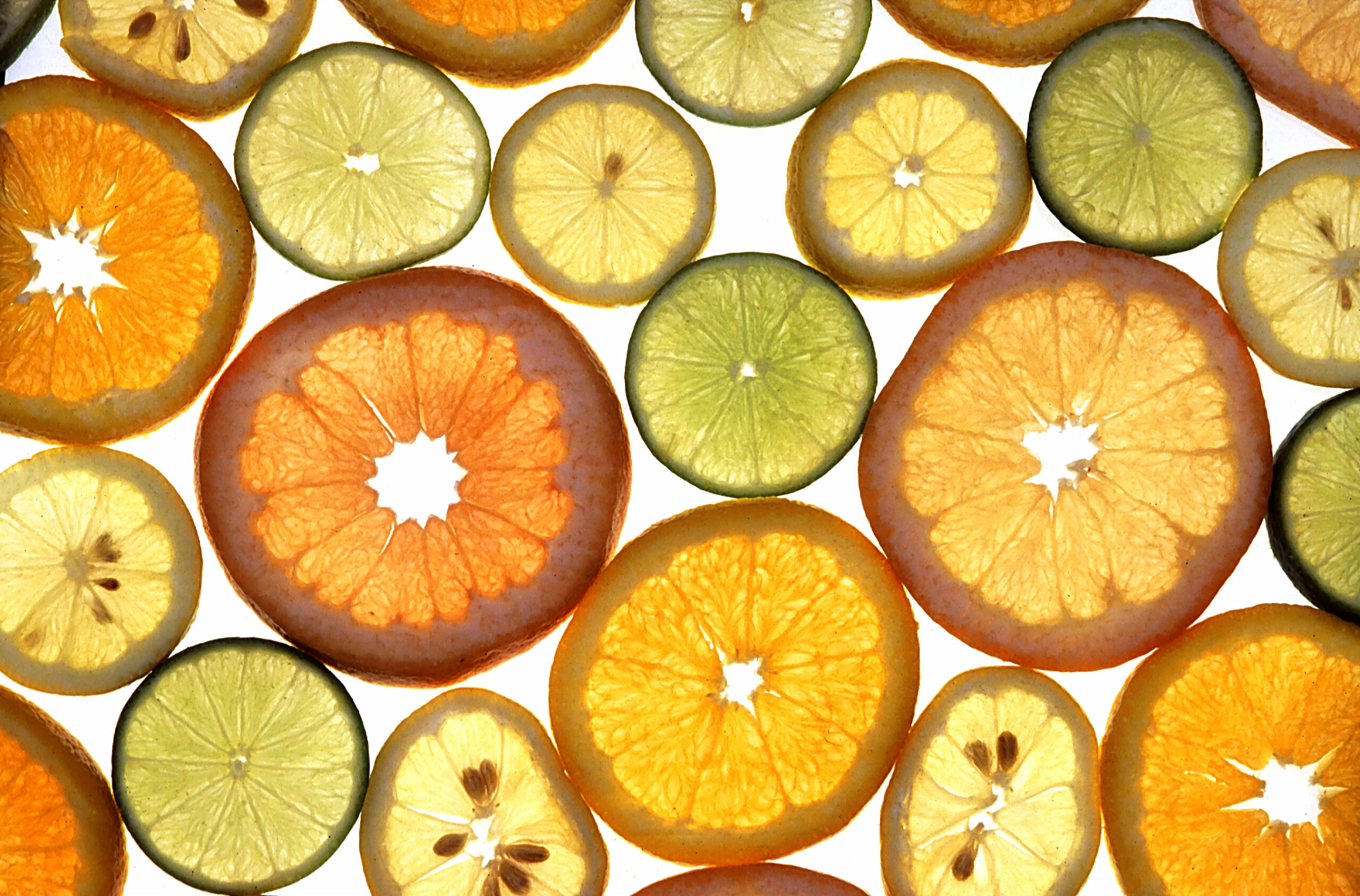 Sliced citrus fruits including oranges and grapefruit
