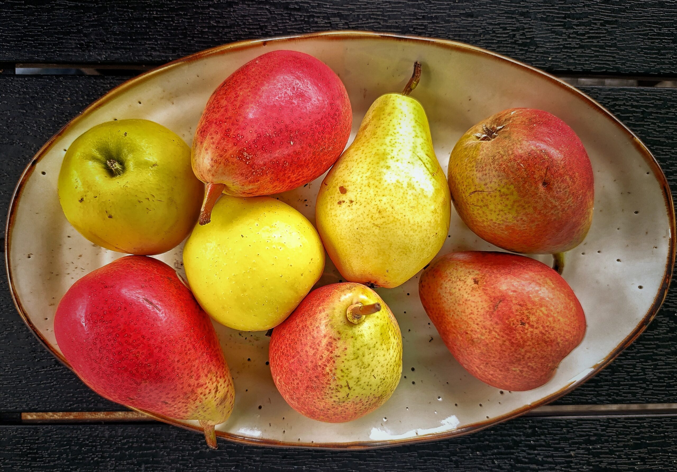 A bowl of apples and pears